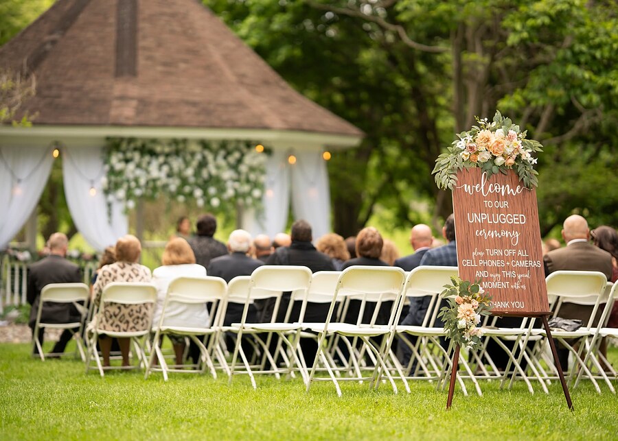 Guests seated for an outdoor wedding ceremony at the gazebo near Brockport, NY