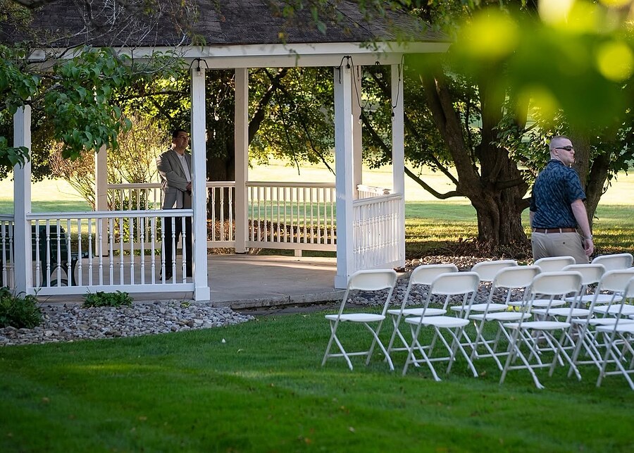 The gazebo with ceremony chairs on the lawn