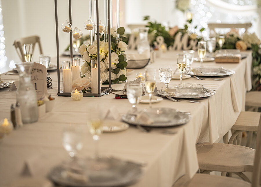 Long reception table set with candles