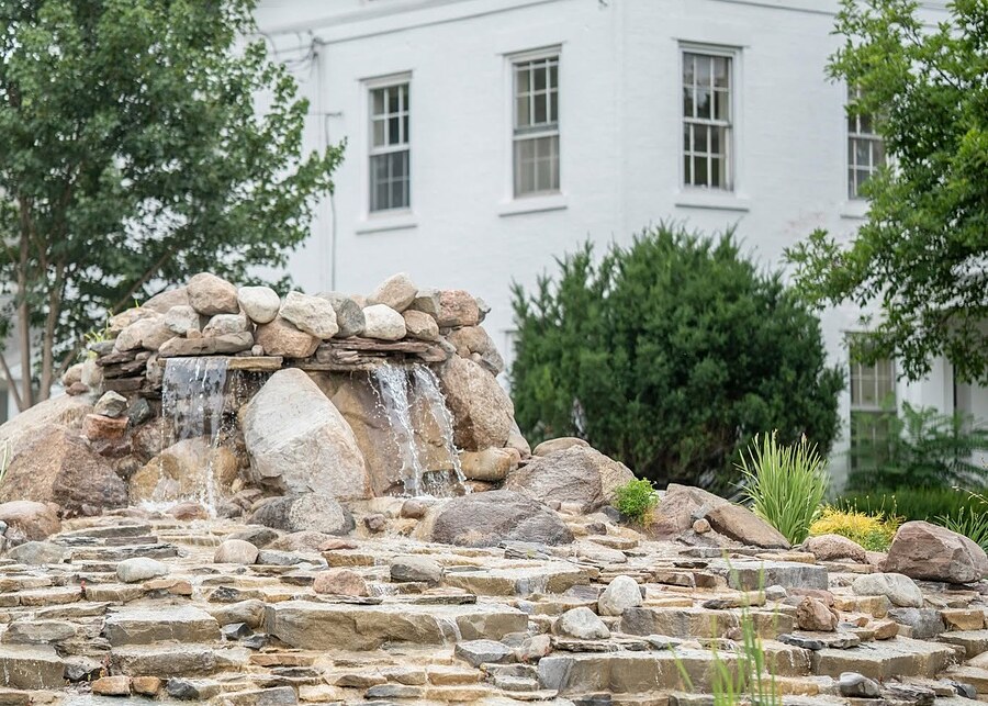 Stone waterfall feature on the grounds at Chef’s Event Center near Hilton, NY