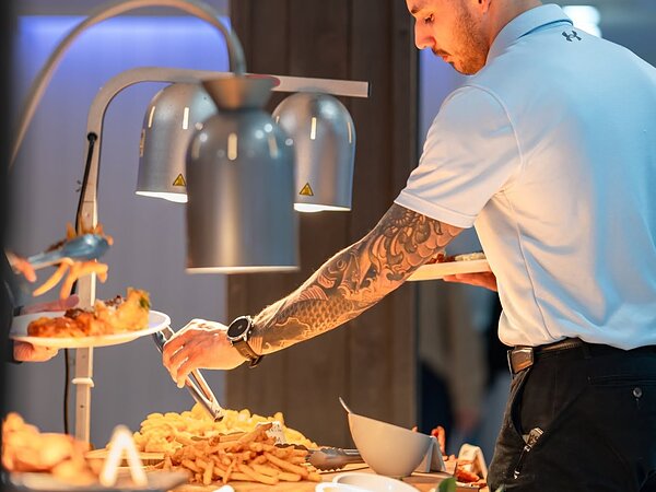 Chef serving at the carving station, Chef's Event Center near Rochester, NY