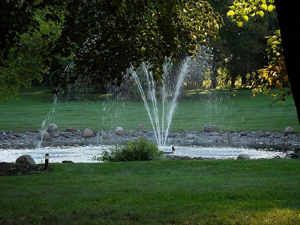 The pond and fountain on the grounds, Chef's Event Center near Rochester, NY