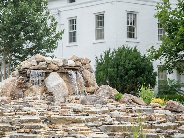 The waterfall and house from the lawn, Chef's Event Center near Rochester, NY