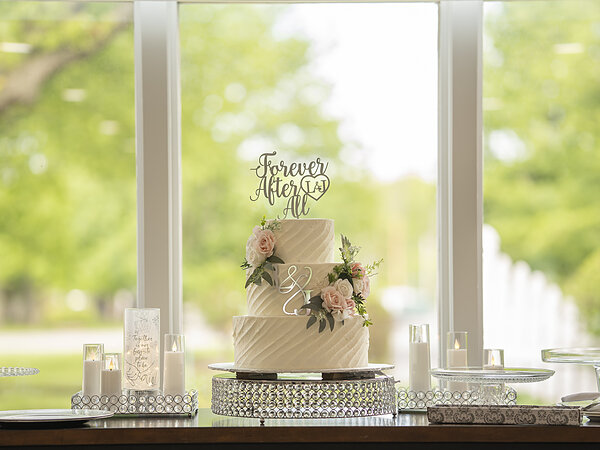 Wedding cake in front of the hall windows, Chef's Event Center near Rochester, NY