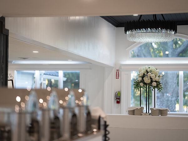 Chandeliers and arched windows in the banquet hall, Chef's Event Center near Rochester, NY