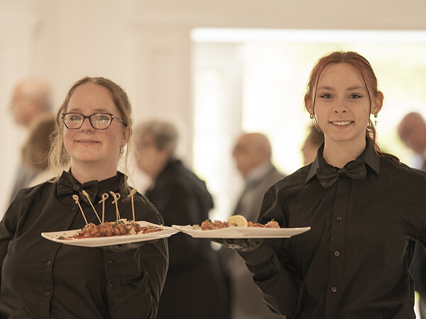 Chef's Catering staff serving appetizers, Chef's Event Center near Rochester, NY